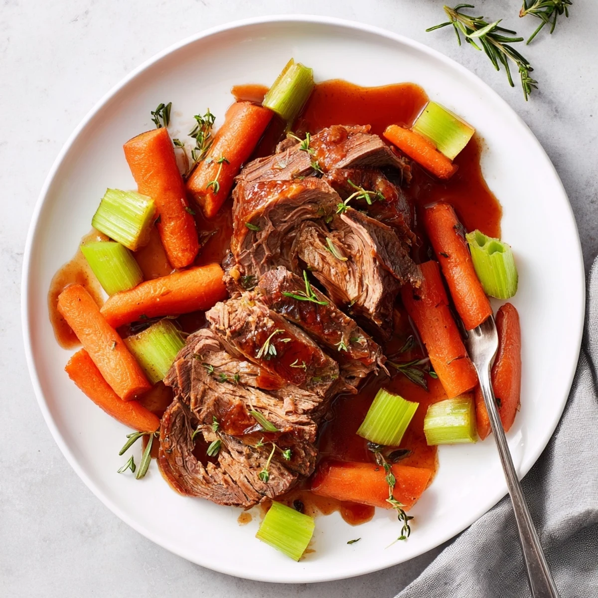 Succulent beef chuck roast slowly braised in red grape juice with fresh herbs