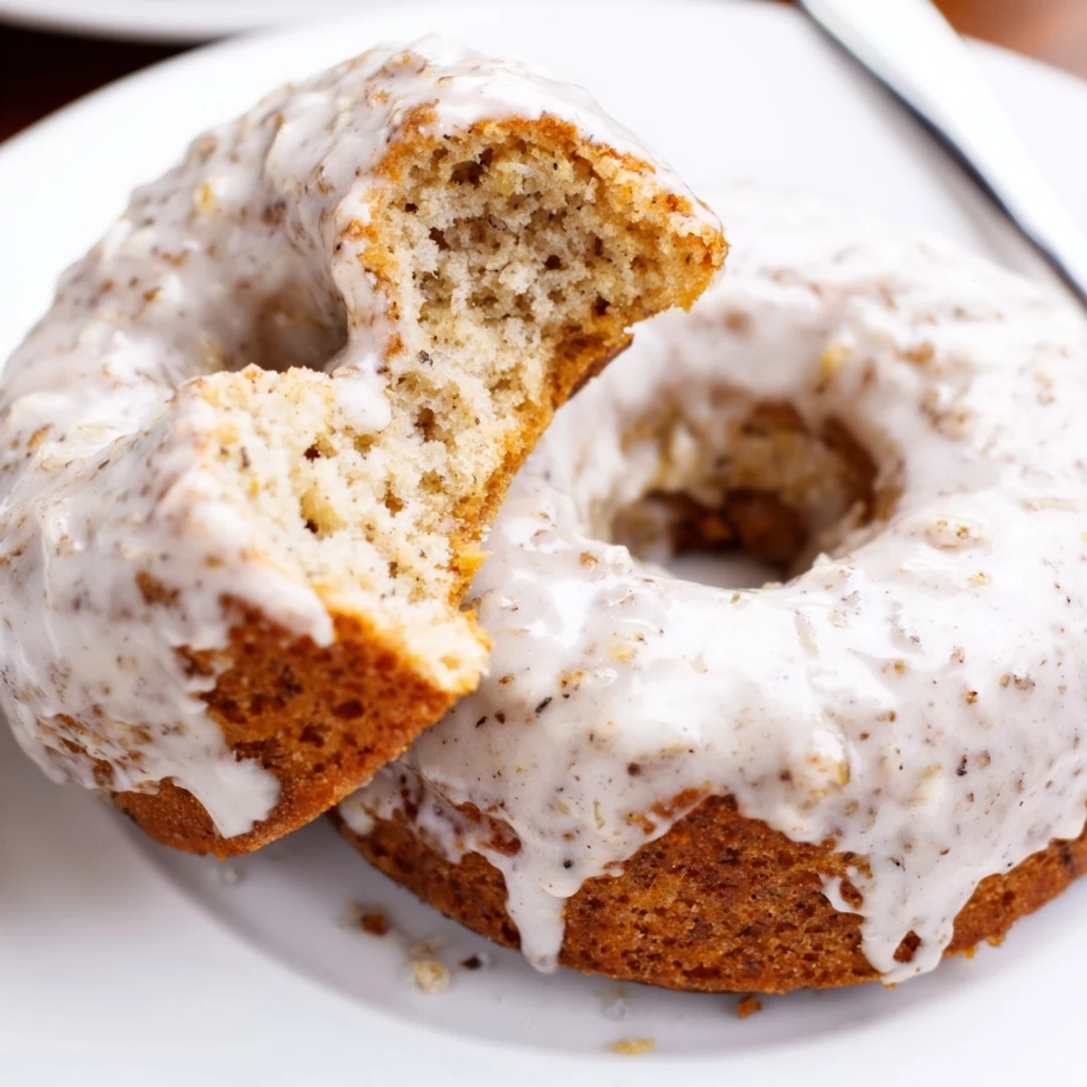 Plate of Banana Donuts served with coffee, fluffy texture and cinnamon