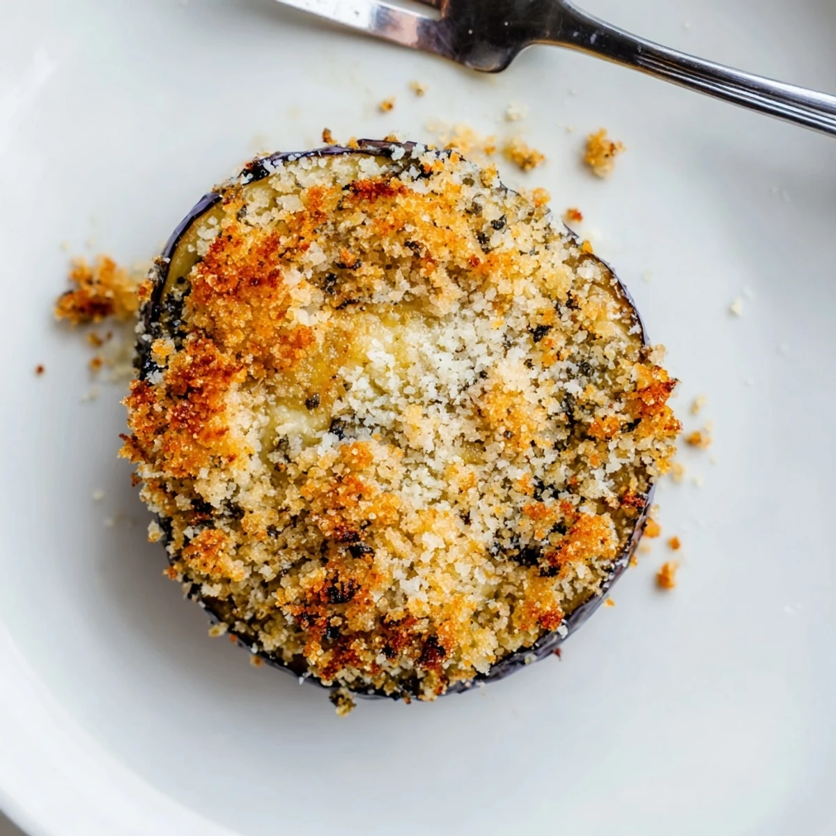 Warm Crispy Baked Eggplant slices with marinara for dipping, sprinkled Parmesan