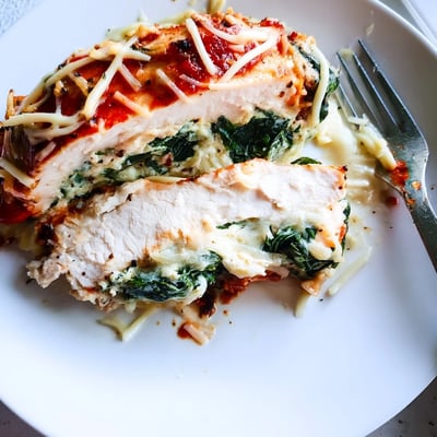 Tender chicken breasts filled with creamy ricotta cheese and fresh spinach baked until golden